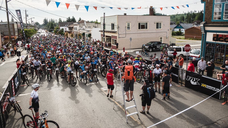 Line up next to the pros at the start.