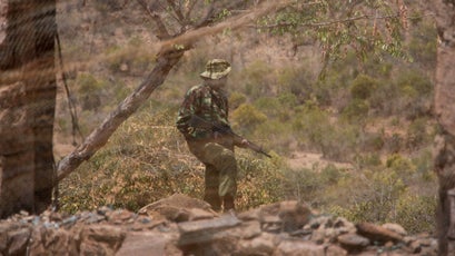 A KDF soldier patrols the site of Tristan Voorspuy's murder.