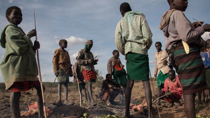 Pokot pastoralist youths barbecue dinner on the Mugie conservancy.