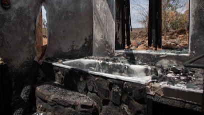 A burned tourist home on Tristan Voorspuy's conservancy.