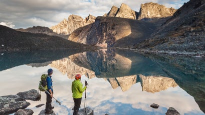 A Girl Is Hiking Beautiful Mountain by Evgeny Vasenev