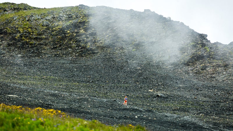 Women's champ Allie Ostrander runs down the scree.