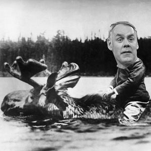 Theodore Roosevelt is shown riding a moose.  Collaged photograph, undated. --- Image by © Underwood & Underwood/CORBIS