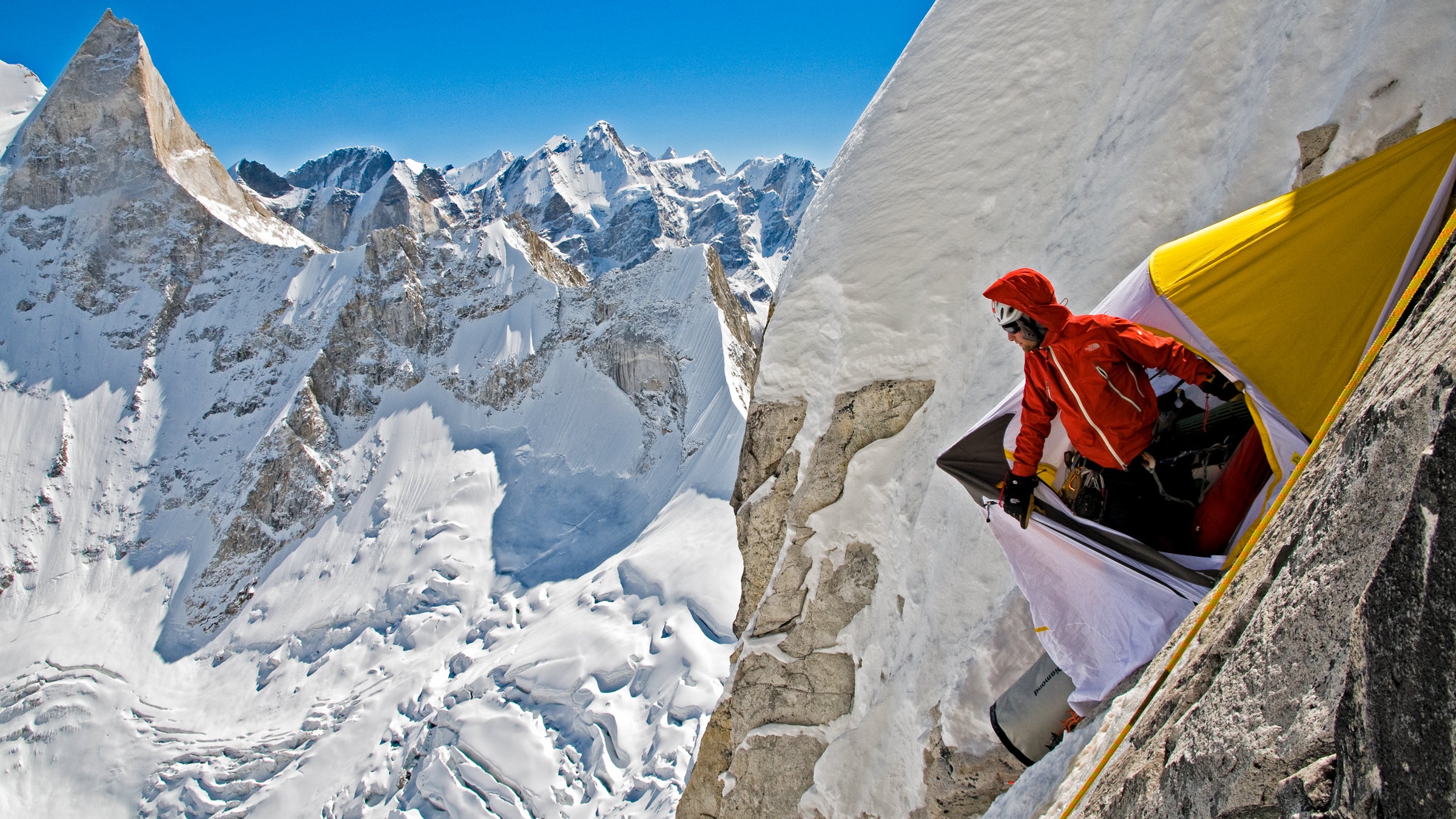 Renan Ozturk looking out of the portaledge during a 2008 expedition on Meru, Garwhal, India.