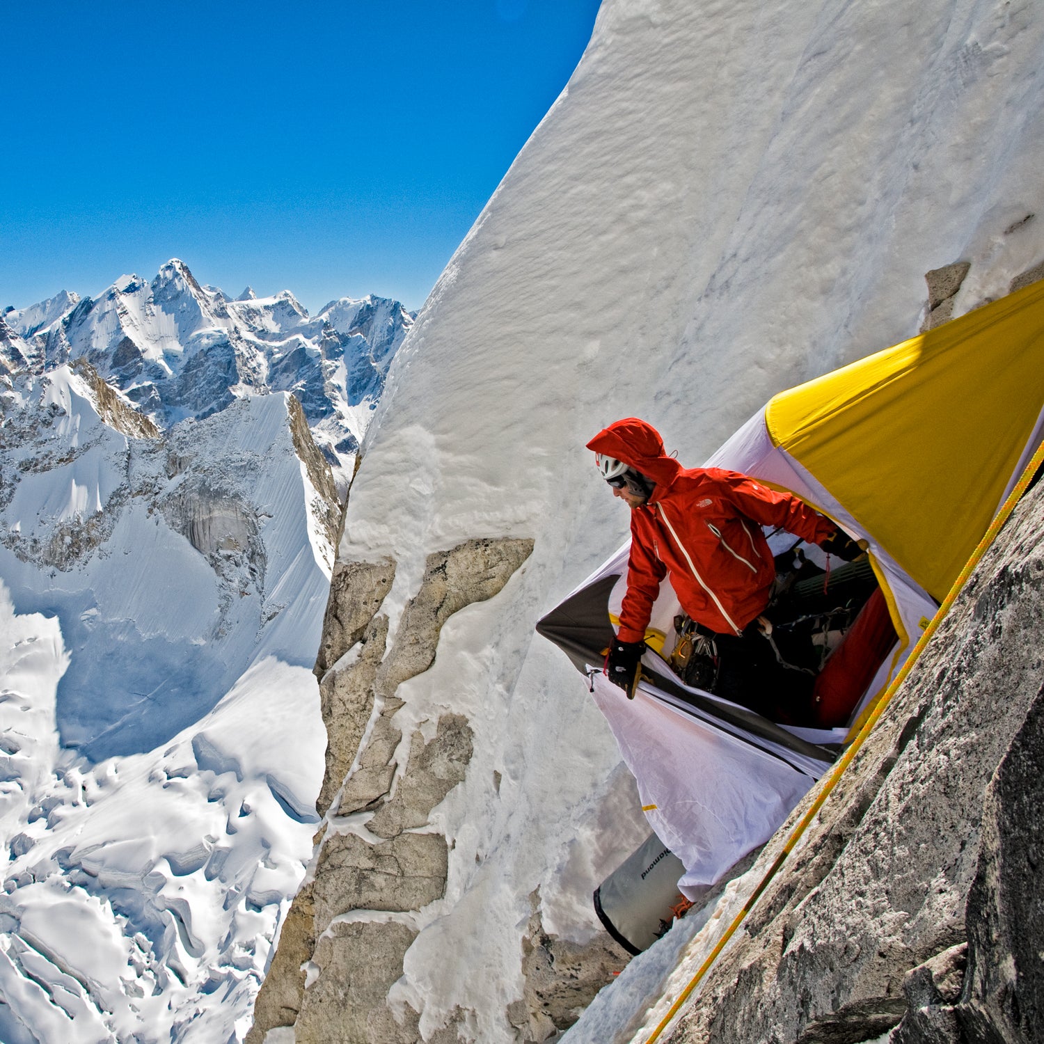 Renan Ozturk looking out of the portaledge during a 2008 expedition on Meru, Garwhal, India.