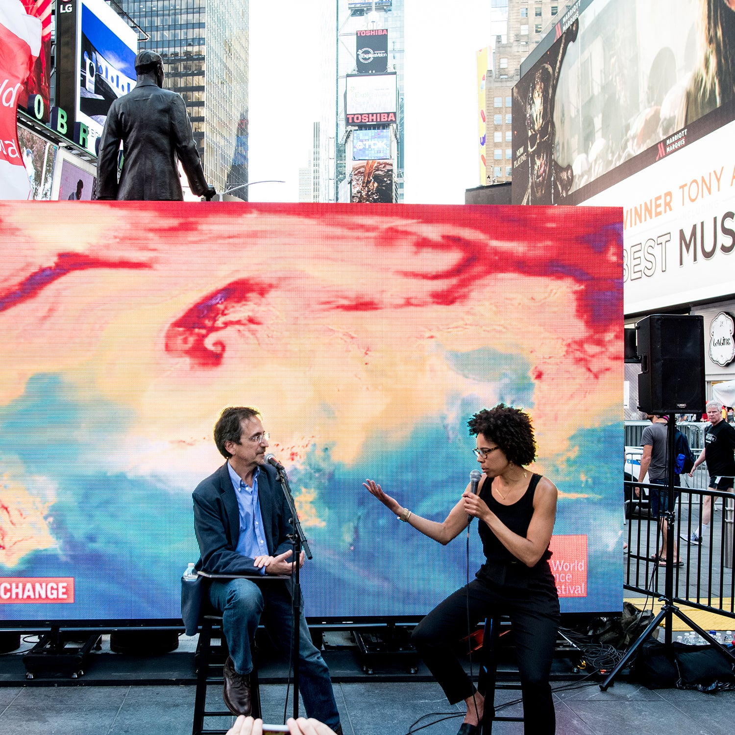 Johnson speaking at the World Science Festival on the impacts of climate change on poor and minority communities.