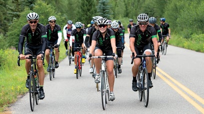 Armstrong rides with his daughter, Grace Armstrong during the Wapiyapi fundraising ride in Aspen, Colorado.