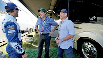 Armstrong and Joe Dilsalvo talk with their friend NASCAR Champion Jimmie Johnson before Jimmie's race at Homestead in Miami, Florida.