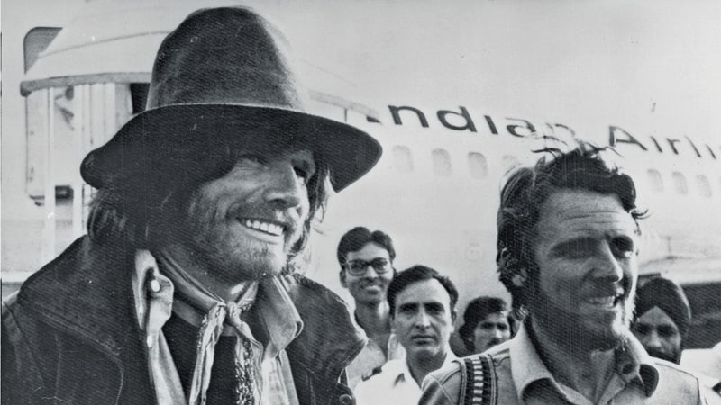 Reinhold Messner, 33, left and Peter Habeler, 35, on their way back to Europe after climbing Mount Everest without oxygen.