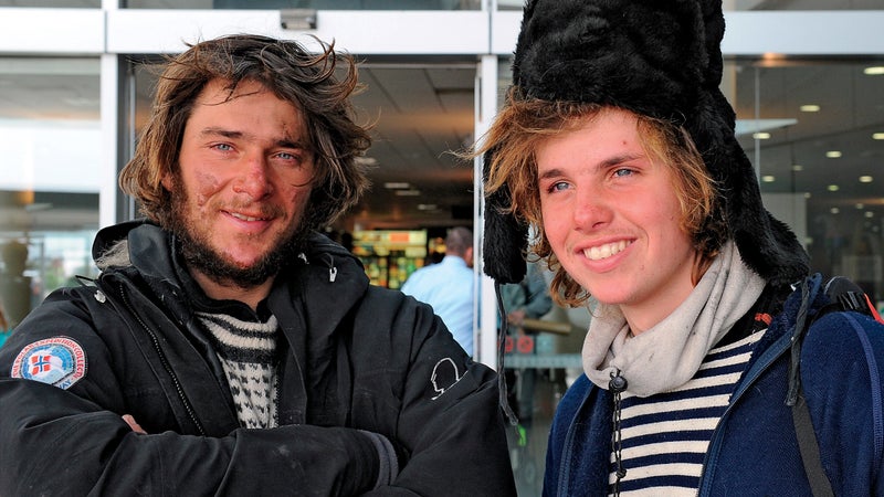 Norwegian adventurers Jarle Andhoy (L), age 34, and Samuel Massie (R), age 18, arrive from Antarctica at Christchurch International Airport on February 28, 2011.