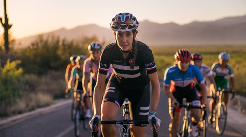 Bertine leading a group ride in Arizona’s Saguaro National Park.