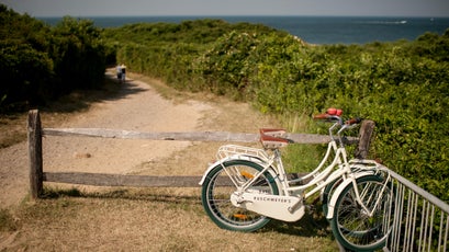 A trail near the site of the Montauk Point lighthouse in Montauk, N.Y., July 24, 2012. The site is one of many locations that offers roads less traveled to different Hamptons, far from the manicured landscapes, mansions and beach crowds. (/The New York Times)