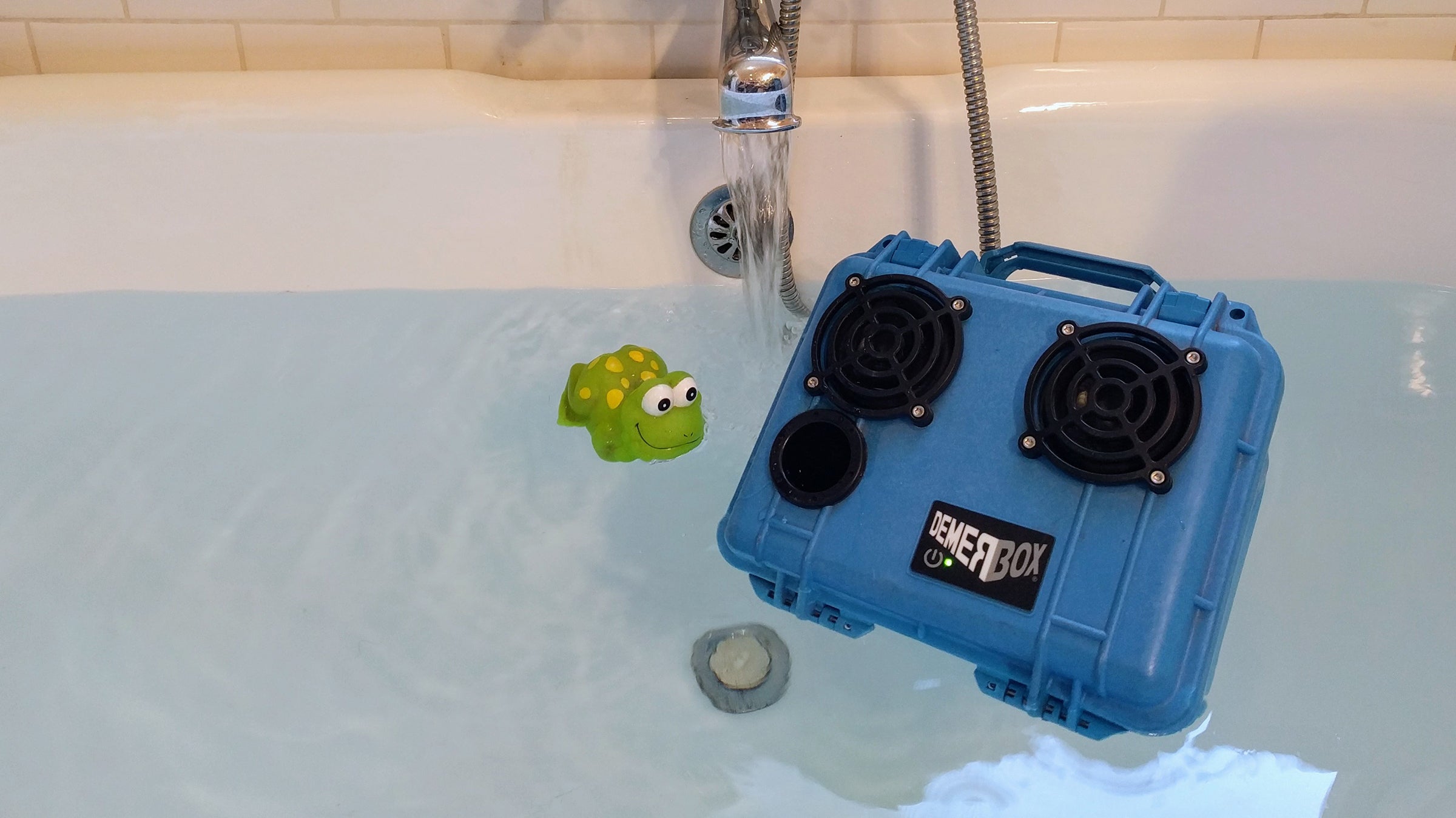 The Demerbox floats, but the weight of the components housed in its lid means it floats upside down. I weighted mine with two tallboys in order to right it.