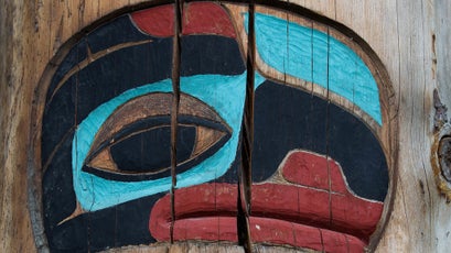 Traditional Chilkat artwork carved into the post of a communal building in Klukwan.