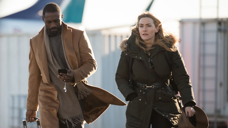 Kate Winslet and Idris Elba star in The Mountain Between Us as Dr. Ben Bass and Alex Martin, who survive a plane crash.