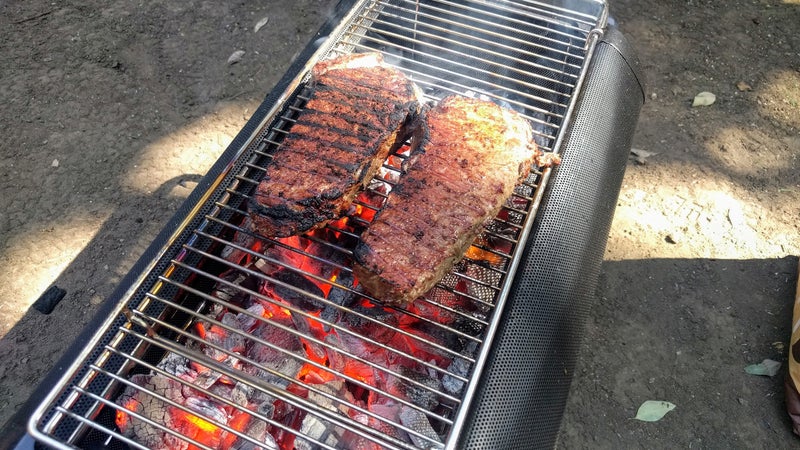 Searing the strips after 30 seconds on one side.