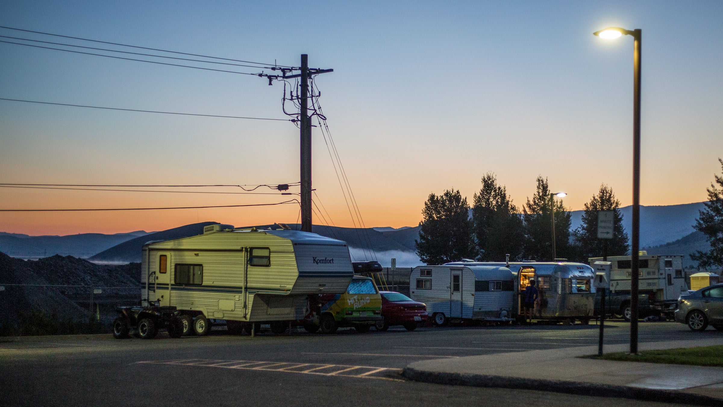 The Jackson Town Council approved a small in-town campground for workers in May as an ad-hoc solution to the town's housing crisis. Nine town and county employees received permits through their employers to camp in the designated area - a strip of parking spaces behind the Teton County/Jackson Recreation Center on the north end of town.