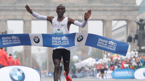 Eliud Kipchoge of Kenya crosses the finish line to win the Berlin Marathon on September 24, 2017 in Berlin