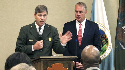 National Park Service Acting Director Mike Reynolds, left, and Interior Secretary Ryan Zinke address Park Service employees at Grand Canyon National Park last week.