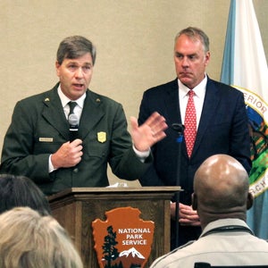 National Park Service acting director Mike Reynolds, left, and Interior Secretary Ryan Zinke address Park Service employees at Grand Canyon National Park, Ariz., on Friday, Oct. 13, 2017. A survey released Friday found nearly two in five Park Service employees experienced some sort of harassment or discrimination in the workplace. (AP Photo/Felicia Fonseca)