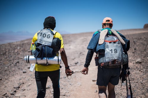 After the valley of death and tunnel crossing, Vlad and Iniceto arrive at a ridge where they are able to absorb the view of the huge part of the the course completed. From the green vegetation along the river crossings to the mars like uphill terrain of the valley of depth. Always with the majestic Licancabur Volcanoe overlooking them.