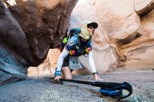 Stage 1 course offers dificulties in all the terains imaginable. Australian runner , Matthew finds a small opening in a canion crevasse and has to crawl on all fours to get through to the other side.