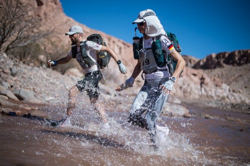 Stage 2: The course offers stunning and sometimes above knee freezing water crossings. Angela from germany and 1st female runner overall glides through this corssing, making things look easy.
