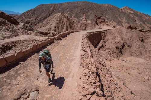An athlete has just entered the Valley of death. This uphill, mars like and mountainess wind blocking terrain, in very high temepreatures, make this part of the course one of the most dificult of the entire race.