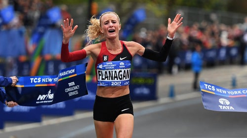 Shalane Flanagan of the US reacts after crossing the finish line to win the Women's Division of the 2017 TCS New York City Marathon in New York on November 5, 2017.