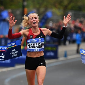 Shalane Flanagan of the US reacts after crossing the finish line to win the Women's Division of the 2017 TCS New York City Marathon in New York on November 5, 2017.