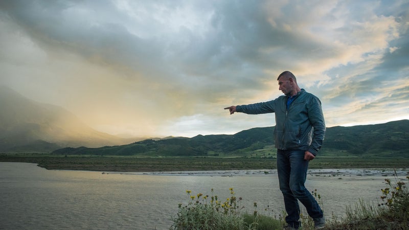 “If the dam is built,” says Taulant Hazizaj, whose village sits on the shores of the Vjosa River in Albania, “all of that will be gone.”