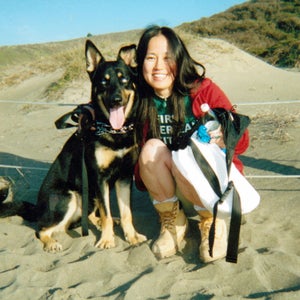 Tomomi Hanamure and her dog, Blues, at Muir Beach, California, January 2002.