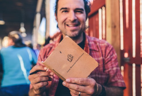 Joe Cruz jotting notes in his trusty, custom made, beer sampling notebook. This was for the 鈥淗ouse Pale鈥, an American pale ale being served at Lost Nation Brewery in Morrisville, VT.