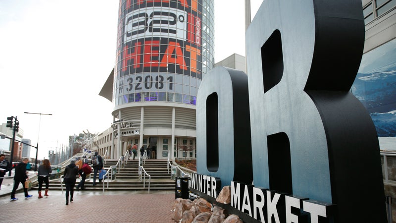 Attendees walk into the Salt Place Convention Center for the 2017 Outdoor Retailer Winter Market, January, 2017. (George Frey/Getty)