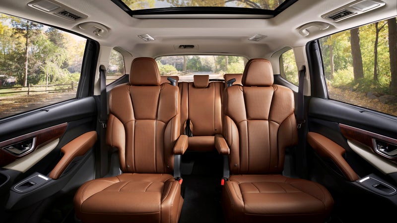 The middle row is available in this luxurious captain's chair arrangement, or a more practical three-person bench.