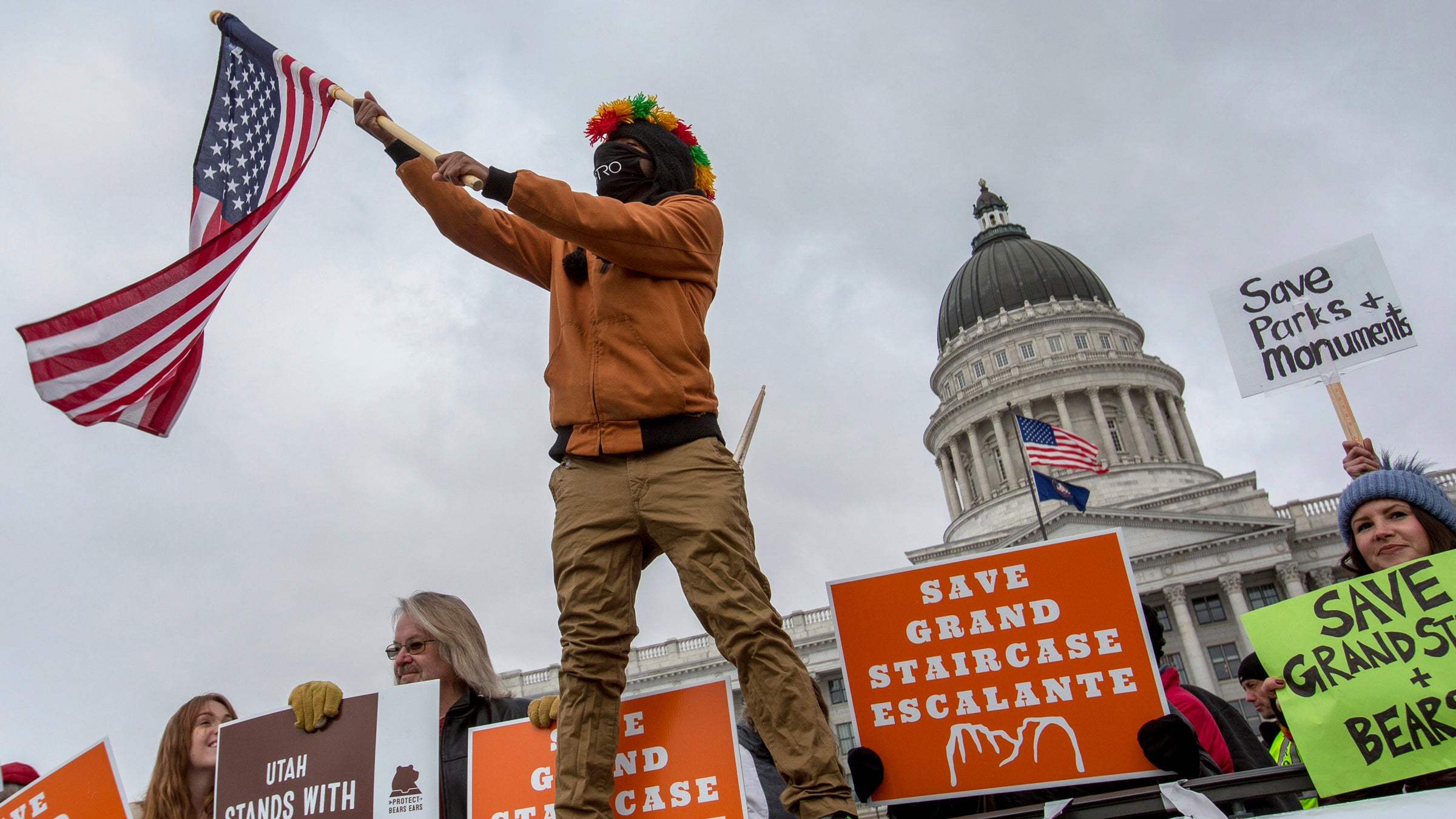 Protesters gather outside of the Utah State Capitol where President Donald Trump spoke to local representatives on Monday, Dec. 4, 2017, in Salt Lake City.