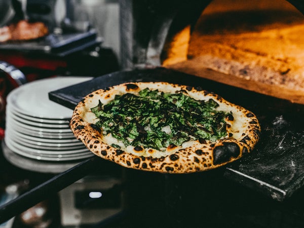 Krar says Pizzicletta's SS-145 pizza combination of Gorgonzola, charred kale, and lemon juice atop a perfectly charred crust is a masterpiece.
