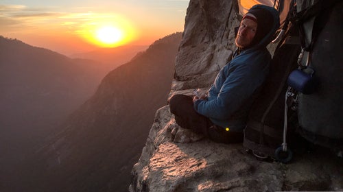 Miller watches the sunset on the way to the top of The Direct Line.