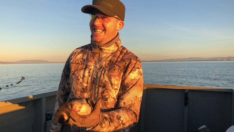 My first duck! I was surprised by how fast they fly, and how easily they can spot, and flare away from a hunter. Shooting from a floating blind, as it bobbed in the waves, added a new dimension to the shooting, too.