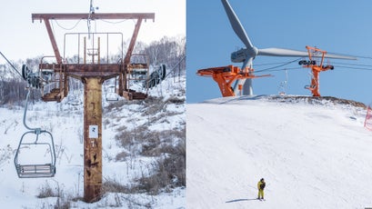 Abandoned Saibei ski resort; a wind turbine pokes from behind a Chang Cheng Ling Ski Resort chairlift.