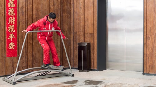 A ski instructor on a ski simulator at Fulong Chongli Four Season Resort