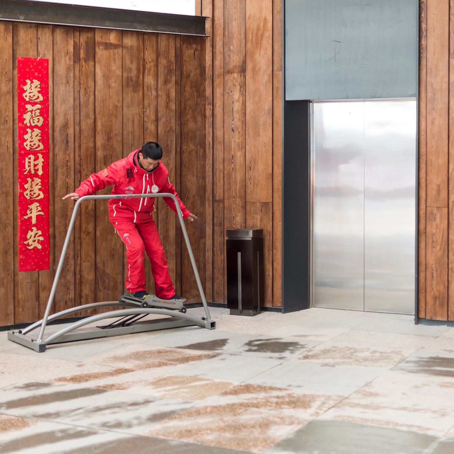 A ski instructor on a ski simulator at Fulong Chongli Four Season Resort