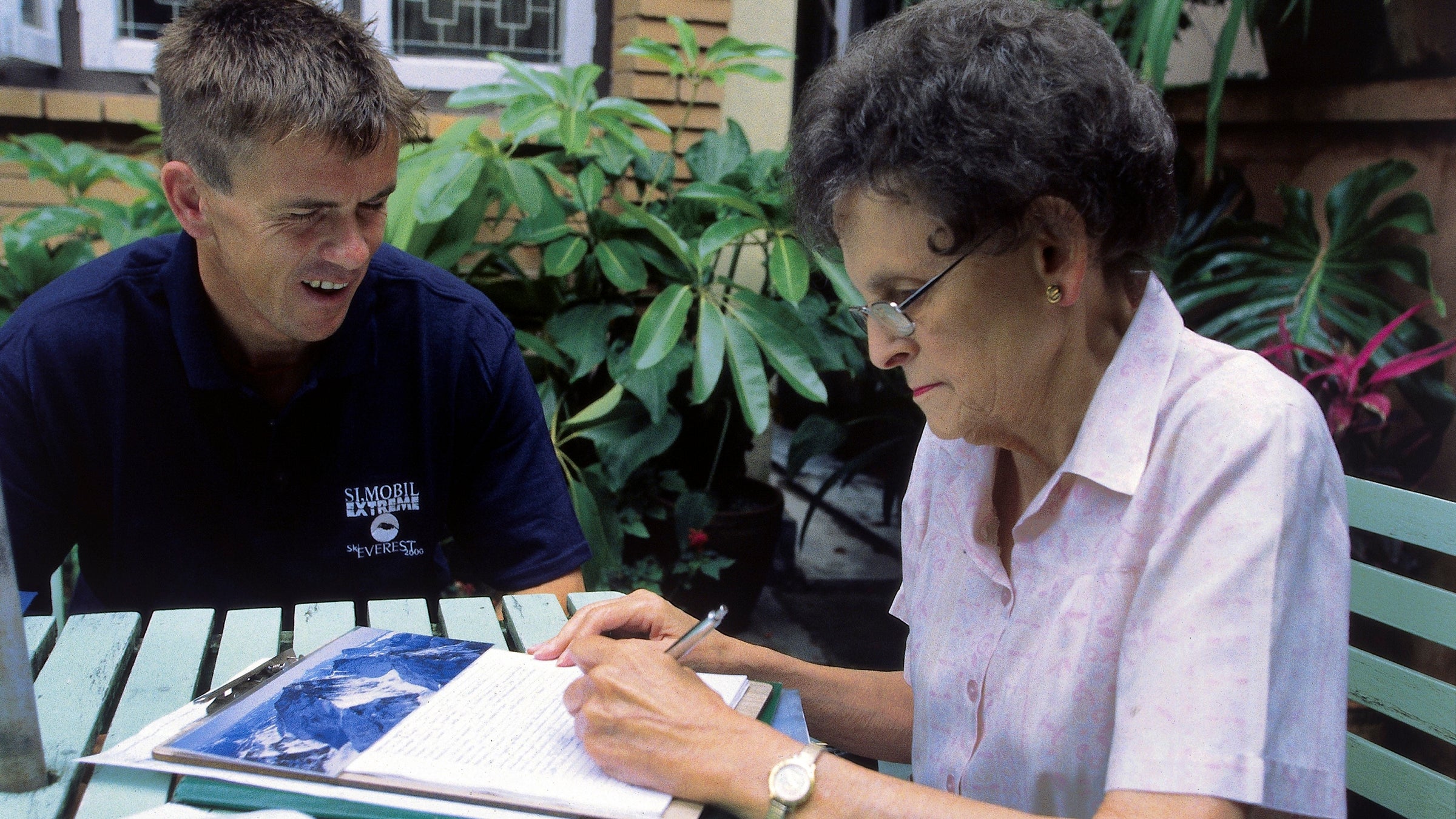 Davo Karnicar and legendary himalayan chronist miss Elisabeth Hawley talking in Kathmandu before his departure to Mount Everest.