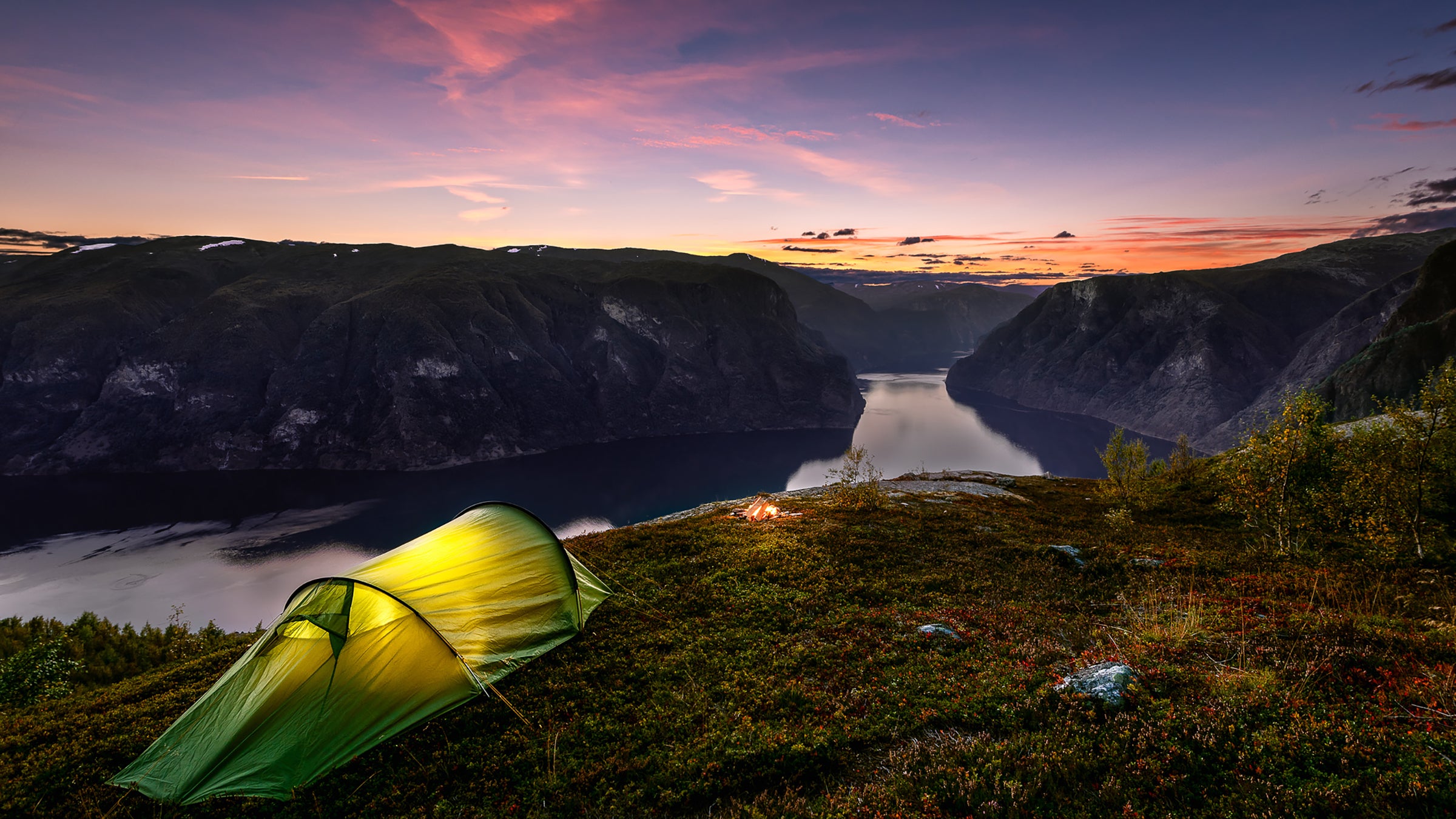 Sunset and Tent in Autumn in Aurlandsfjord, Norway.