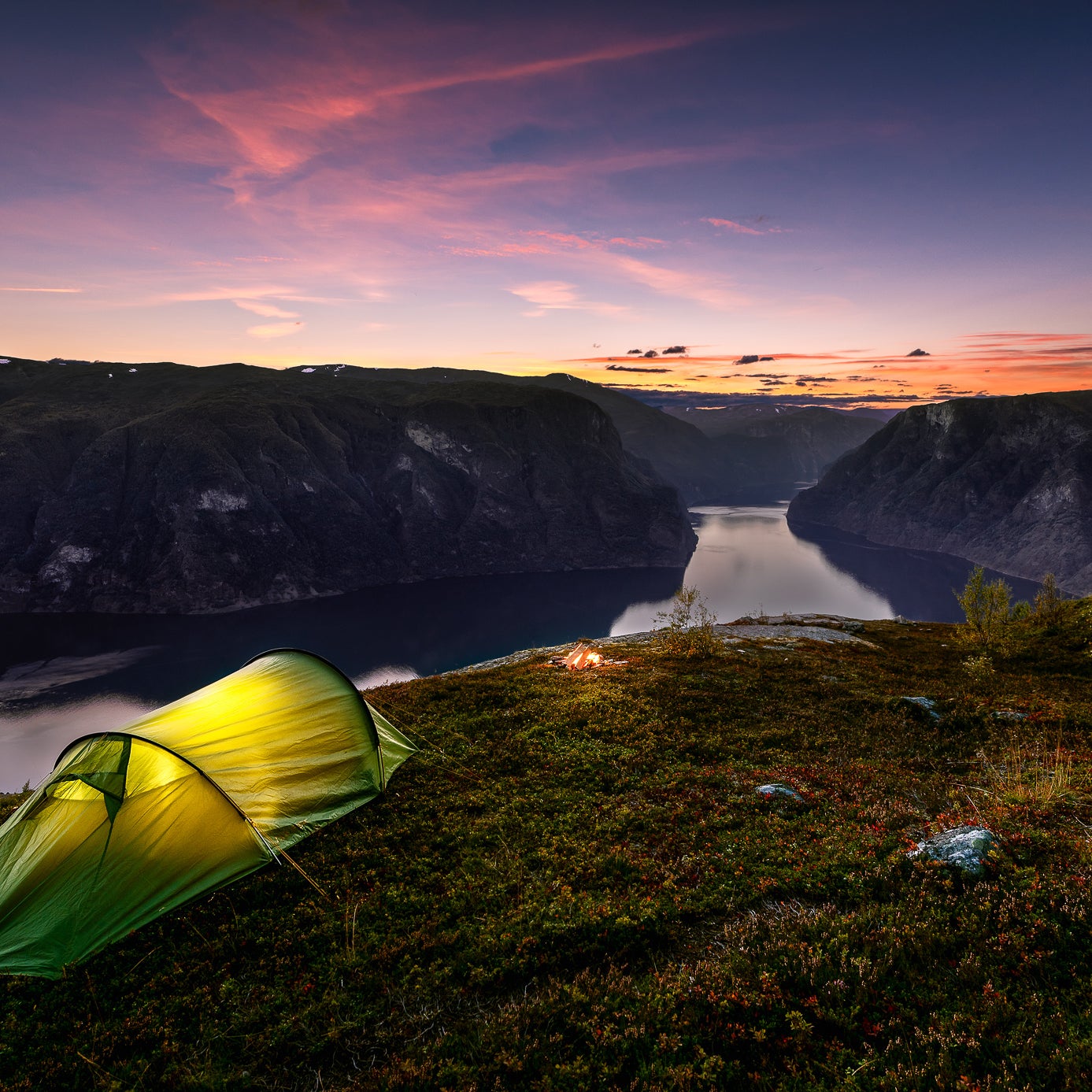 Sunset and Tent in Autumn in Aurlandsfjord, Norway.