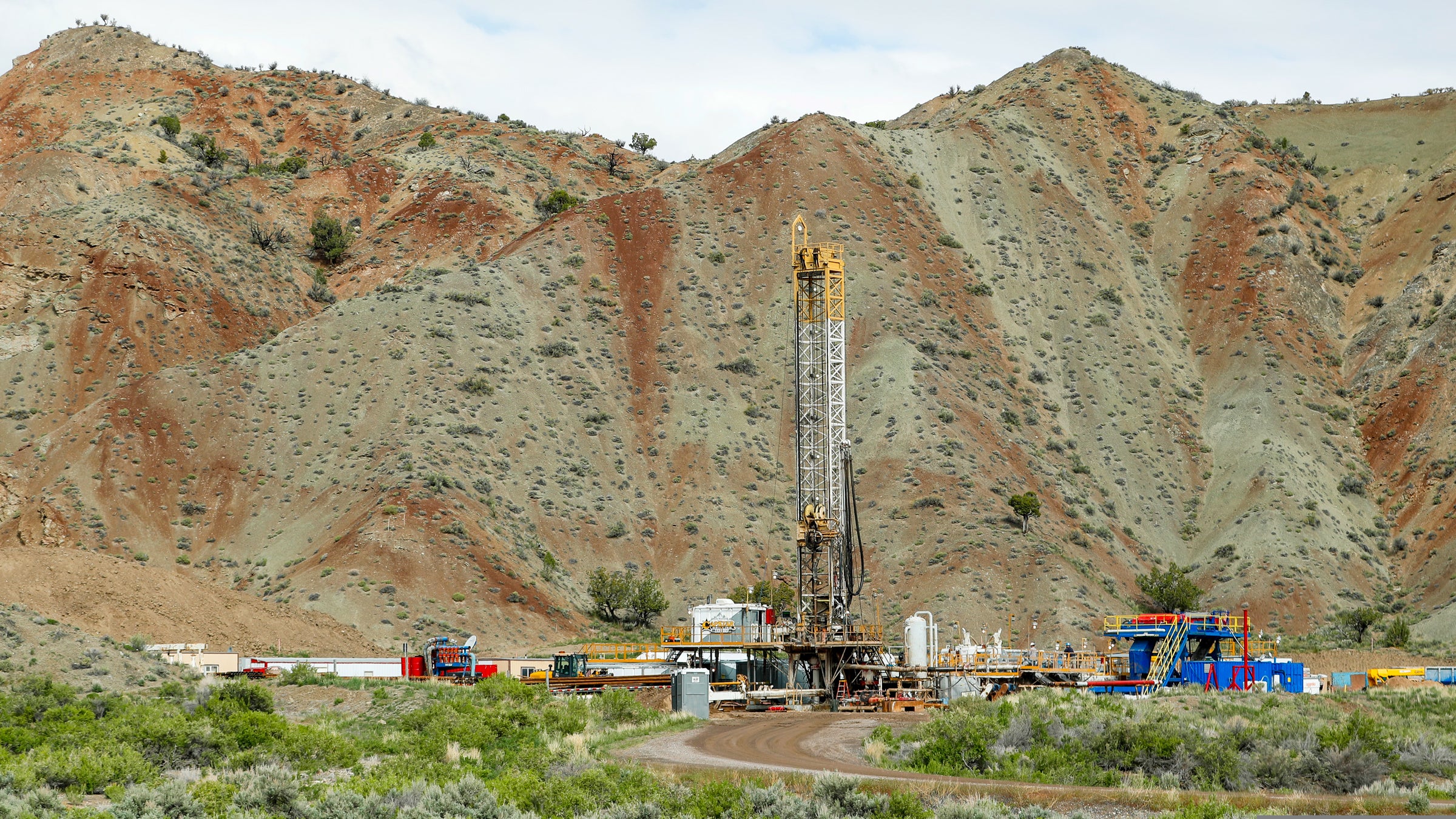 An oil drilling rig operates on May 10, 2017 outside Richfield, Utah.