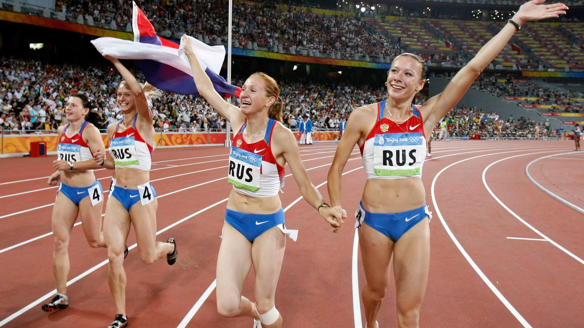 Russia was stripped of a relay gold medal from the 2008 Beijing Olympics after Yuliya Chermoshanskaya (right) tested positive for steroids.