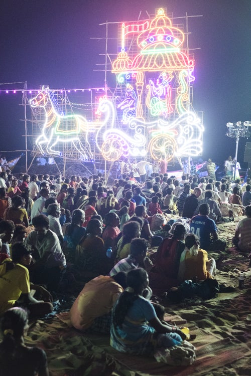 A small local festival sets in a few feet from the waves in Mahabalipuram during a balmy weekend night. Towering neon lights depicting Hindu deities line the waterfront and light up the growing crowd that has come to see local music and dance performances. Events like this pepper the yearly calendar and between the surfing, and pilgrimages to the UNESCO world heritage monuments, dull moments are seldom.