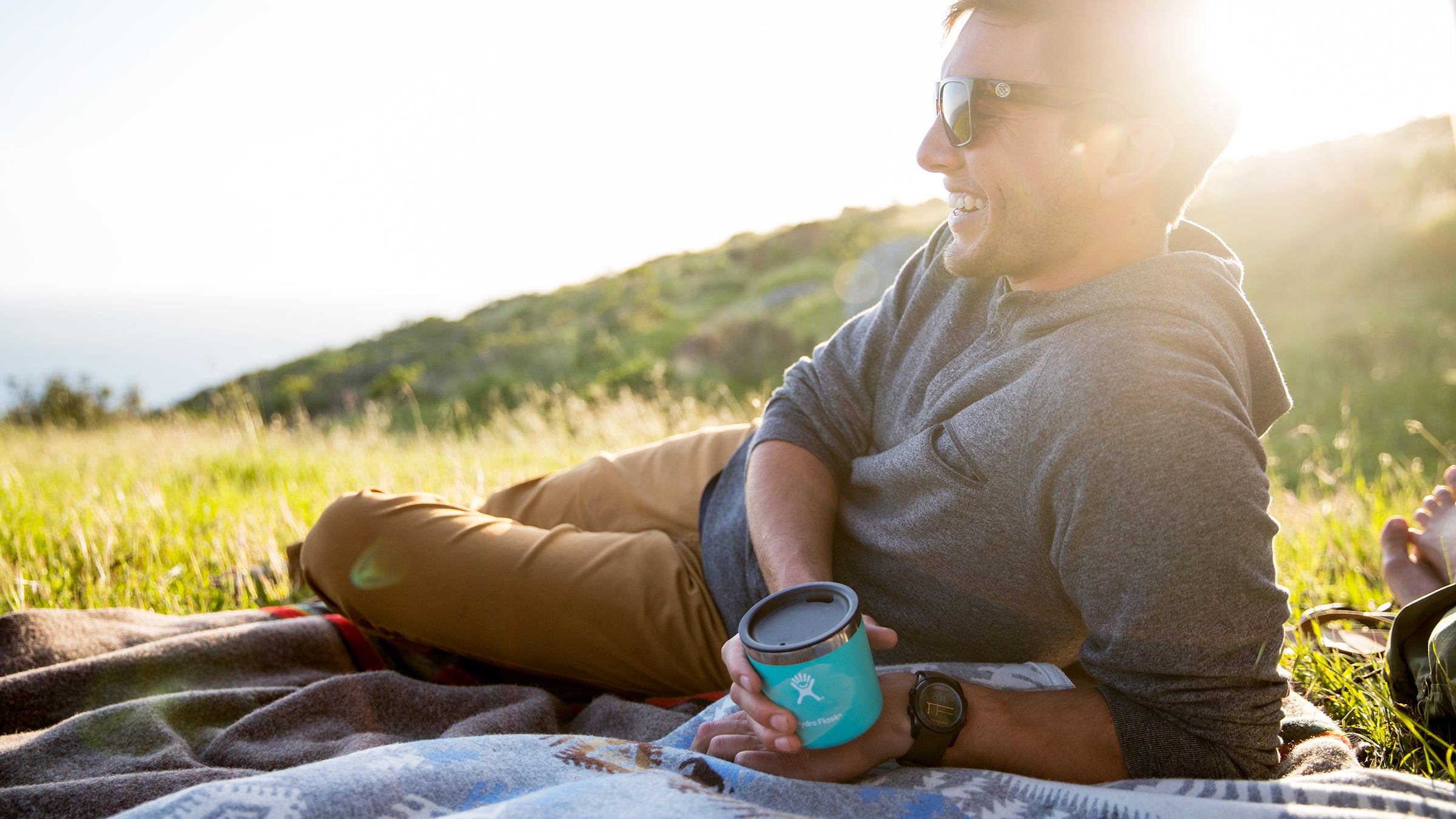 https://cdn.outsideonline.com/wp-content/uploads/2018/02/14/hydroflask-rocks-cup-grass_h.jpg