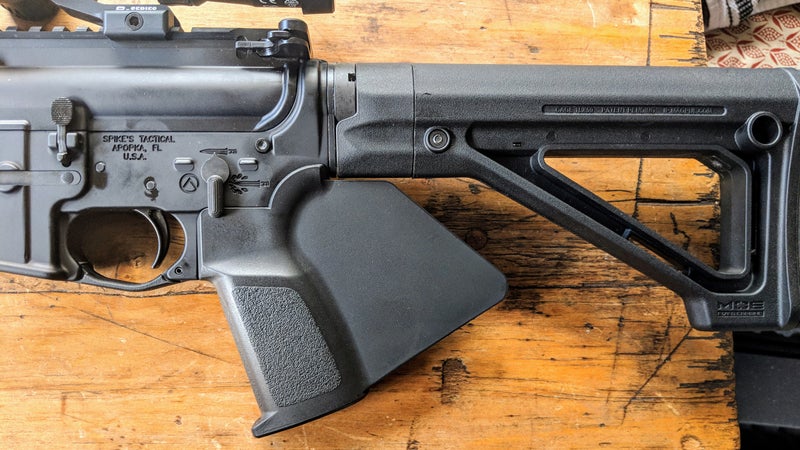My newly California-compliant AR-15. Think that grip looks hard to hang onto? You're right. Think a ridiculous fin makes this gun any less deadly than any other? It doesn't.